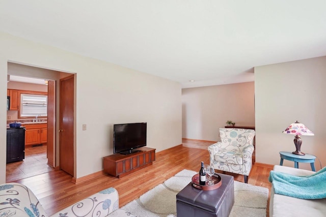 4901 Ralph Cir, Madison, WI 53714 - living area with light wood-type flooring and baseboards