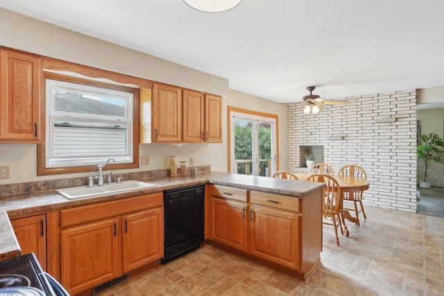 4901 Ralph Cir, Madison, WI 53714 - kitchen with black appliances, a sink, a ceiling fan, a peninsula, and brown cabinetry
