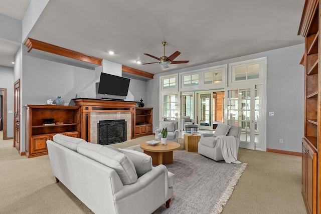 441 E Apple Creek Rd, Appleton, WI 54913 - living room with a tiled fireplace, ceiling fan, light colored carpet, recessed lighting, and baseboards