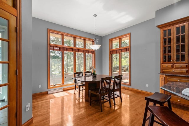 441 E Apple Creek Rd, Appleton, WI 54913 - dining room featuring baseboards and light wood-style flooring