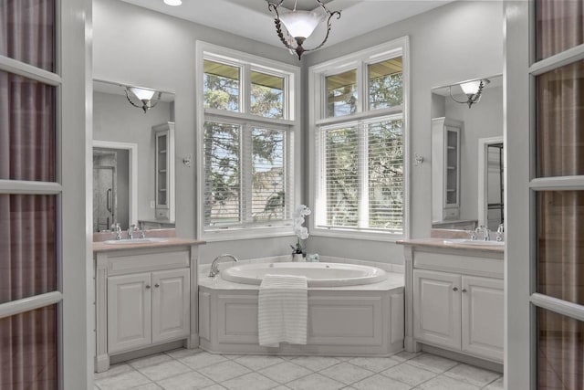 441 E Apple Creek Rd, Appleton, WI 54913 - full bathroom with plenty of natural light, tile patterned flooring, and two vanities