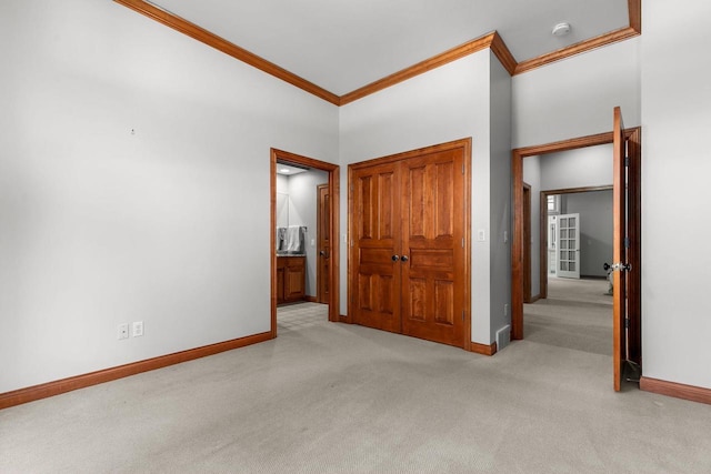 441 E Apple Creek Rd, Appleton, WI 54913 - unfurnished bedroom with ornamental molding, carpet, baseboards, and ensuite bath