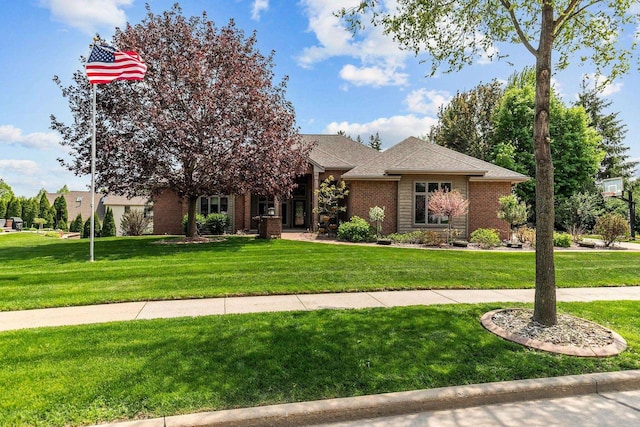 441 E Apple Creek Rd, Appleton, WI 54913 - view of front of house with a front yard and brick siding