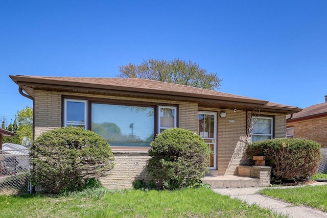 view of front of house featuring brick siding