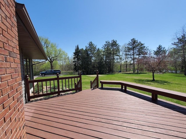 171 8th St, Clintonville, WI 54929 - wooden terrace with a lawn