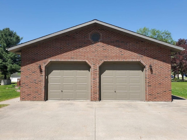 171 8th St, Clintonville, WI 54929 - garage featuring concrete driveway