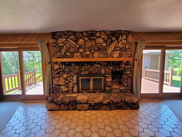 171 8th St, Clintonville, WI 54929 - unfurnished living room featuring plenty of natural light and wooden walls