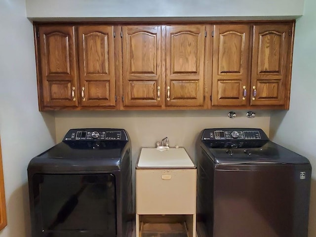 171 8th St, Clintonville, WI 54929 - clothes washing area with independent washer and dryer and cabinet space
