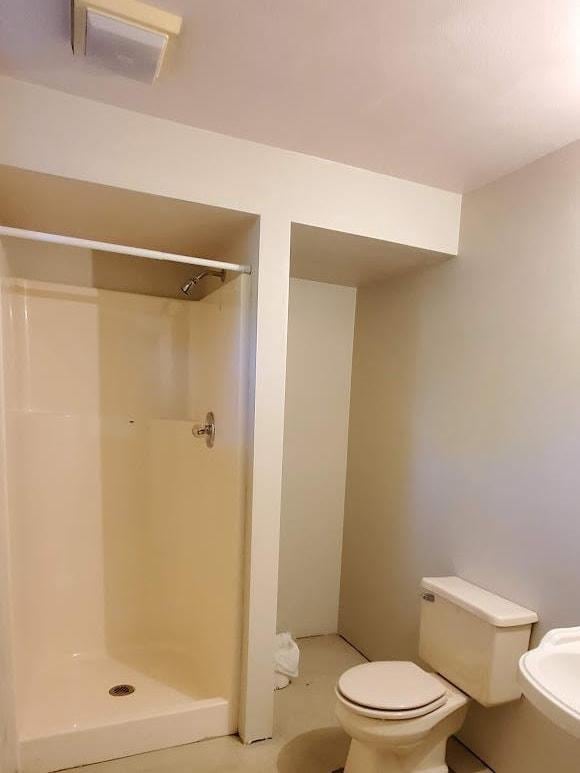171 8th St, Clintonville, WI 54929 - full bathroom with a shower stall and toilet