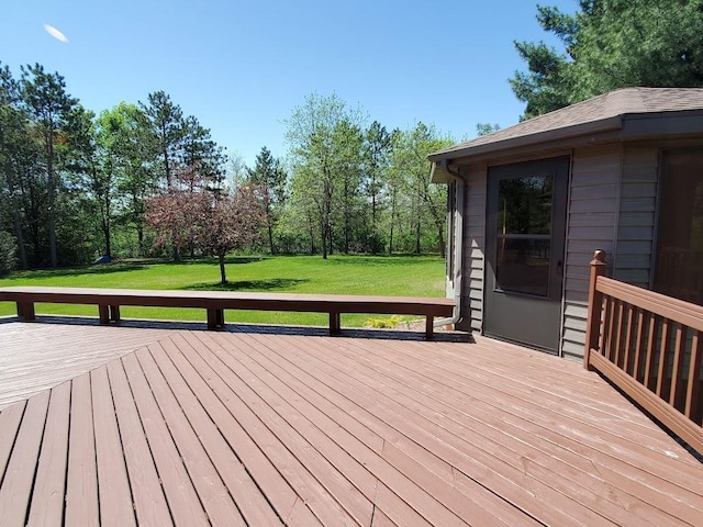 171 8th St, Clintonville, WI 54929 - wooden terrace featuring a lawn