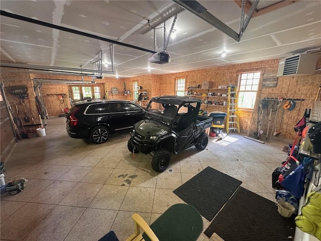 W735 County Road D, Birchwood, WI 54817 - garage featuring a garage door opener