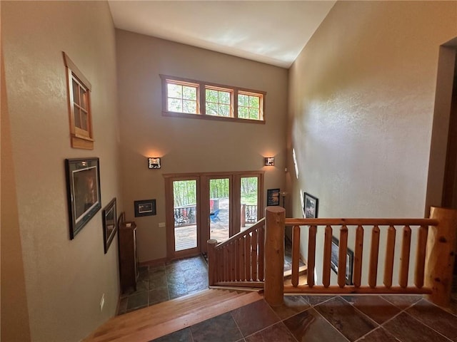 W735 County Road D, Birchwood, WI 54817 - foyer entrance with a high ceiling, stone tile flooring, and baseboards