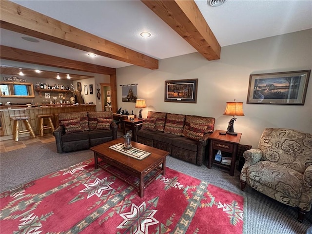 W735 County Road D, Birchwood, WI 54817 - carpeted living room with bar with sink, beam ceiling, and recessed lighting