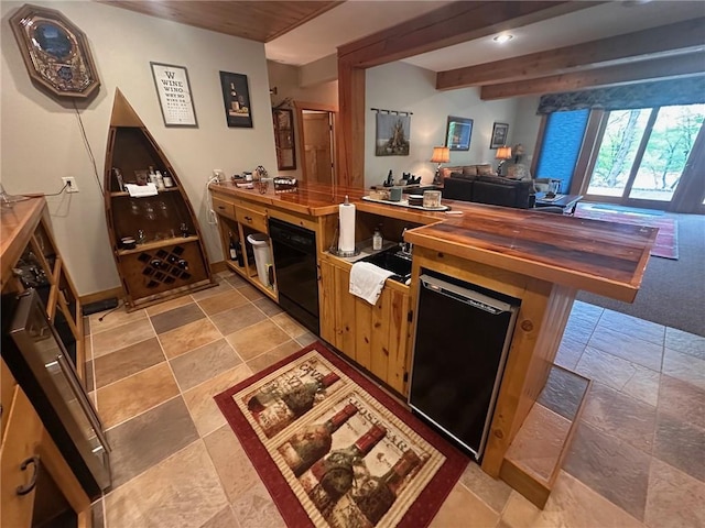 W735 County Road D, Birchwood, WI 54817 - bar with black dishwasher, stone tile flooring, and baseboards