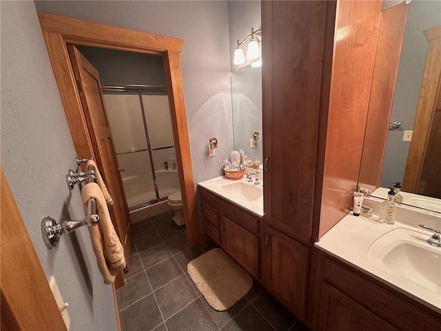 W735 County Road D, Birchwood, WI 54817 - full bathroom featuring a stall shower, tile patterned floors, toilet, and vanity