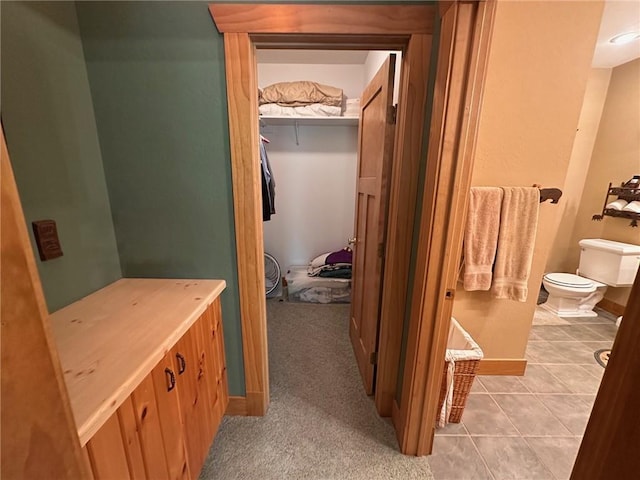 W735 County Road D, Birchwood, WI 54817 - hallway with light tile patterned floors and baseboards