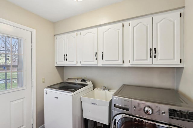 1714 Lewon Dr, Madison, WI 53711 - laundry room with cabinet space, washing machine and clothes dryer, and healthy amount of natural light