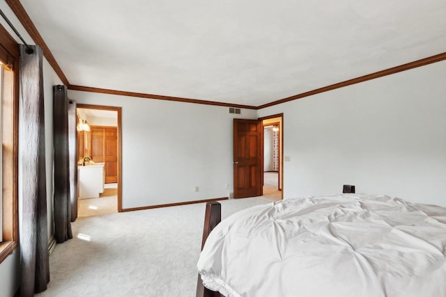 1714 Lewon Dr, Madison, WI 53711 - bedroom featuring light colored carpet, baseboards, ornamental molding, and ensuite bath