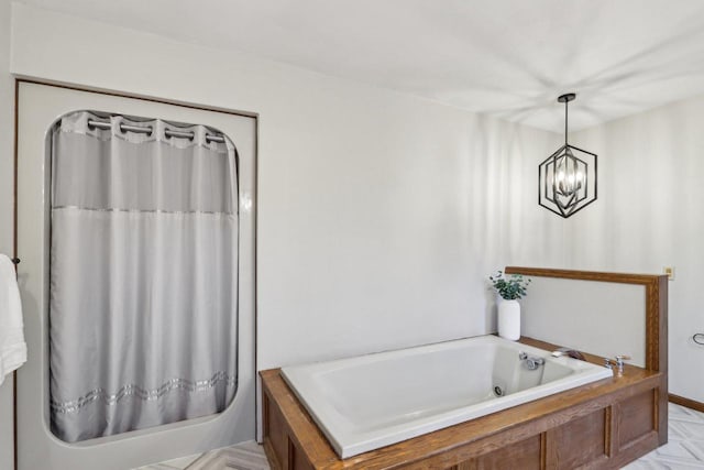 1714 Lewon Dr, Madison, WI 53711 - full bath featuring a garden tub and a chandelier