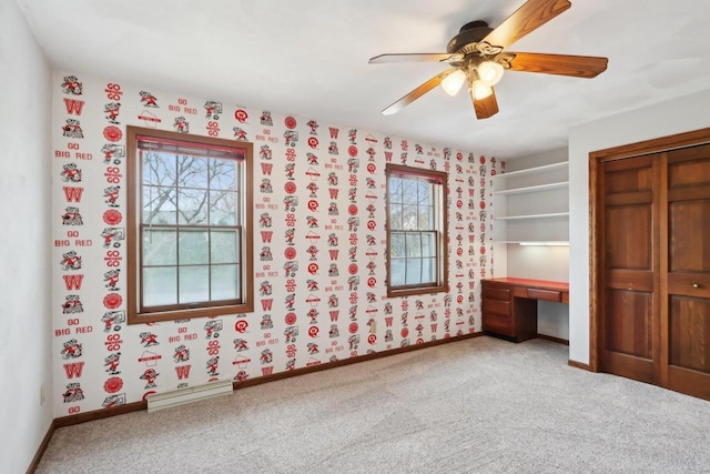 1714 Lewon Dr, Madison, WI 53711 - unfurnished bedroom with light colored carpet, baseboards, and a ceiling fan