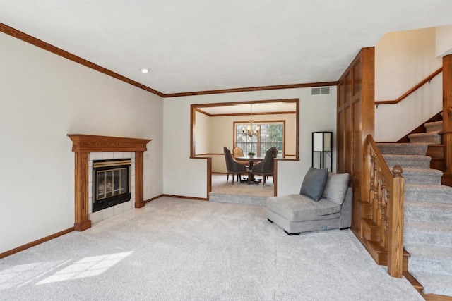 1714 Lewon Dr, Madison, WI 53711 - living room featuring light colored carpet, stairway, a chandelier, ornamental molding, and baseboards
