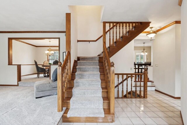 1714 Lewon Dr, Madison, WI 53711 - stairway with a chandelier, ornamental molding, and baseboards
