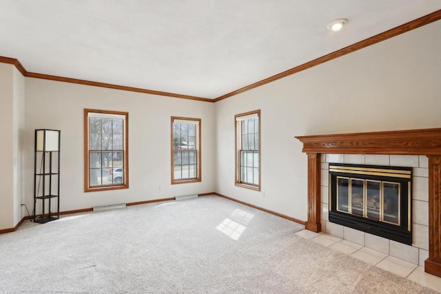 1714 Lewon Dr, Madison, WI 53711 - unfurnished living room with carpet, baseboards, a tile fireplace, and crown molding