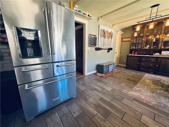 E6355 County Road D Dr, Colfax, WI 54730 - kitchen featuring stainless steel fridge, dark wood finished floors, and baseboards