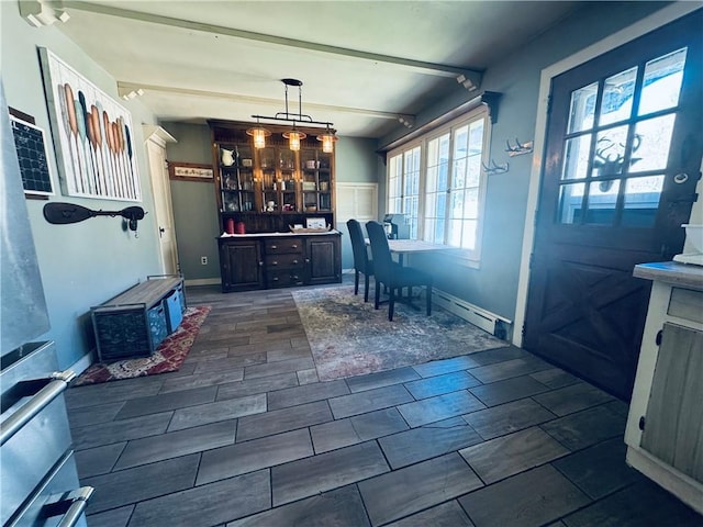 E6355 County Road D Dr, Colfax, WI 54730 - dining room with baseboard heating and beamed ceiling