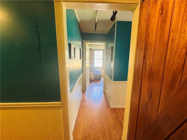 E6355 County Road D Dr, Colfax, WI 54730 - hallway featuring wood finished floors, wainscoting, and ornamental molding
