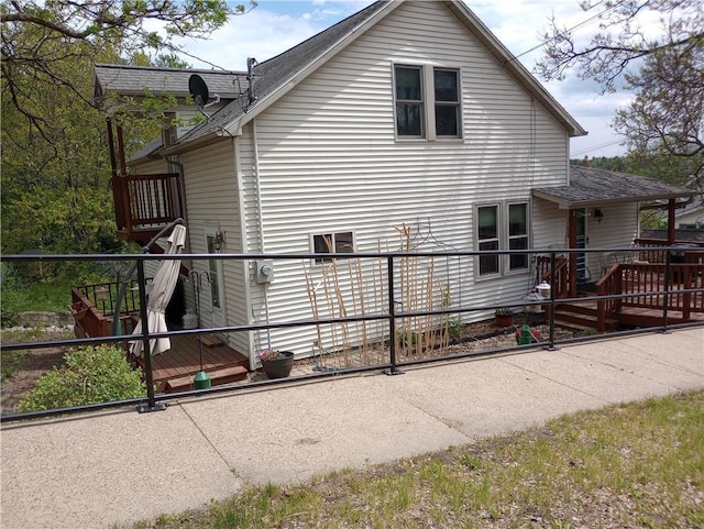 109 3rd St, Black River Falls, WI 54615 - view of property exterior featuring roof with shingles