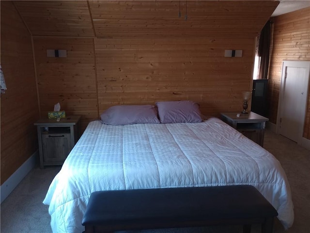 109 3rd St, Black River Falls, WI 54615 - bedroom featuring wooden walls, light colored carpet, wooden ceiling, and lofted ceiling