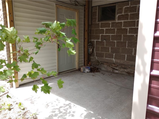 109 3rd St, Black River Falls, WI 54615 - doorway to property featuring a patio area