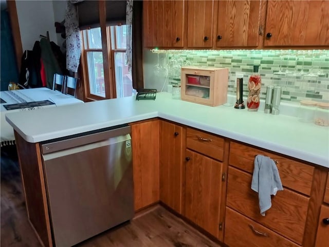 109 3rd St, Black River Falls, WI 54615 - kitchen featuring stainless steel dishwasher, brown cabinets, and light countertops
