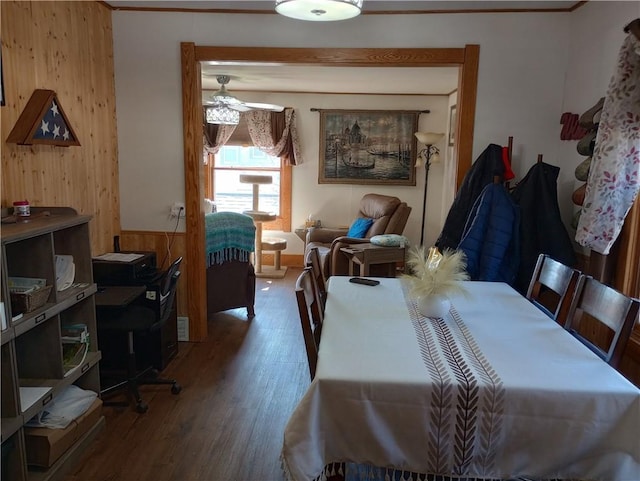 109 3rd St, Black River Falls, WI 54615 - bedroom featuring wooden walls and wood finished floors