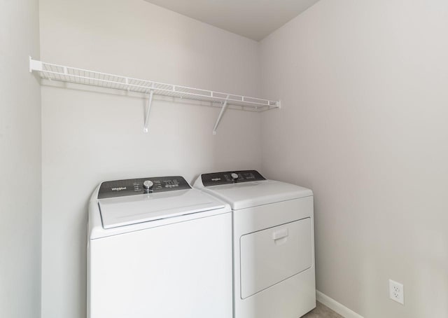 9120 Valley View Rd, Verona, WI 53593 - laundry area with washer and clothes dryer and baseboards