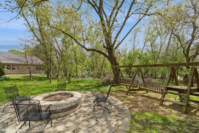 N3116 Tamarack Rd, Lake Geneva, WI 53147 - view of patio / terrace featuring an outdoor fire pit