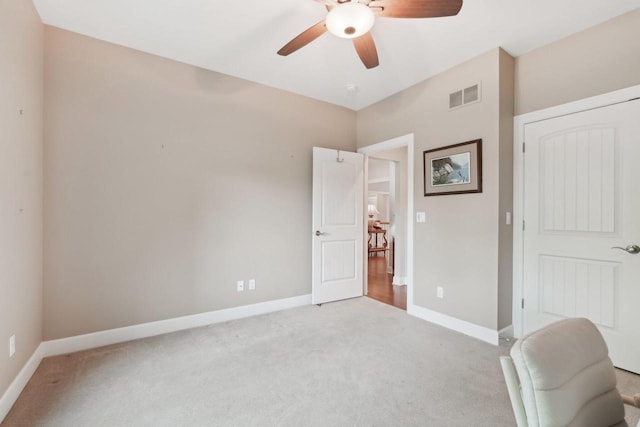 2140 Prairie View Pt, Lake Geneva, WI 53147 - home office featuring a ceiling fan, light carpet, and baseboards