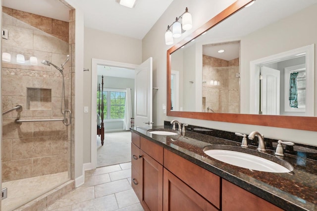 2140 Prairie View Pt, Lake Geneva, WI 53147 - full bath with a shower stall, tile patterned flooring, double vanity, and baseboards