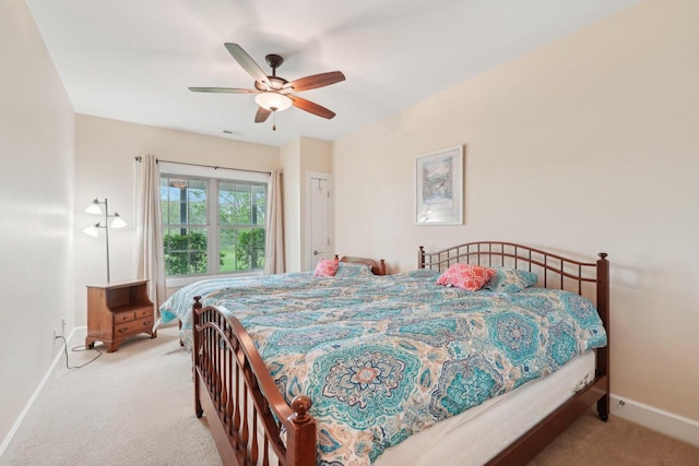 2140 Prairie View Pt, Lake Geneva, WI 53147 - bedroom featuring light carpet, baseboards, and a ceiling fan