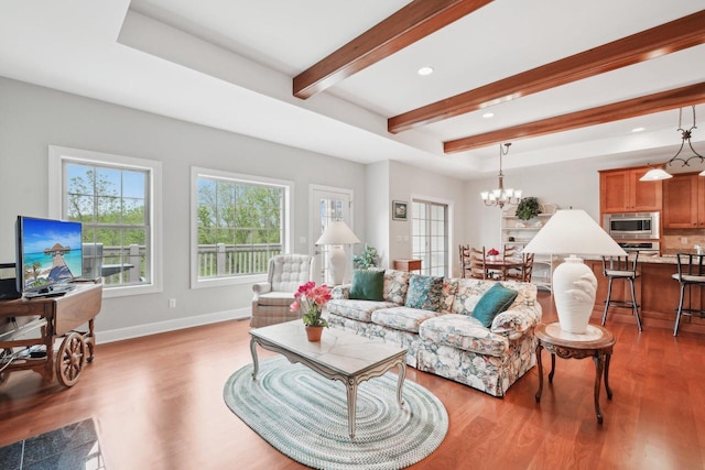 2140 Prairie View Pt, Lake Geneva, WI 53147 - living area with light wood-style flooring, beamed ceiling, baseboards, recessed lighting, and a chandelier