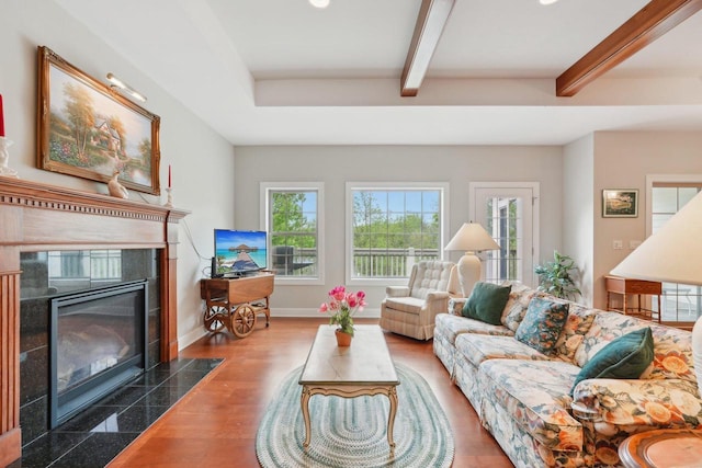 2140 Prairie View Pt, Lake Geneva, WI 53147 - living room with beamed ceiling, baseboards, a tiled fireplace, and recessed lighting