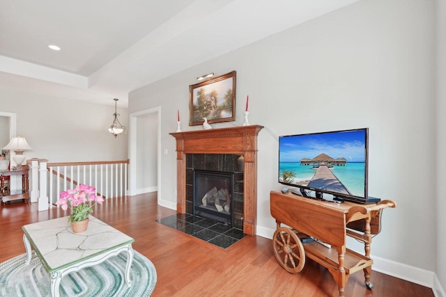 2140 Prairie View Pt, Lake Geneva, WI 53147 - living room featuring wood finished floors, baseboards, a fireplace, and recessed lighting