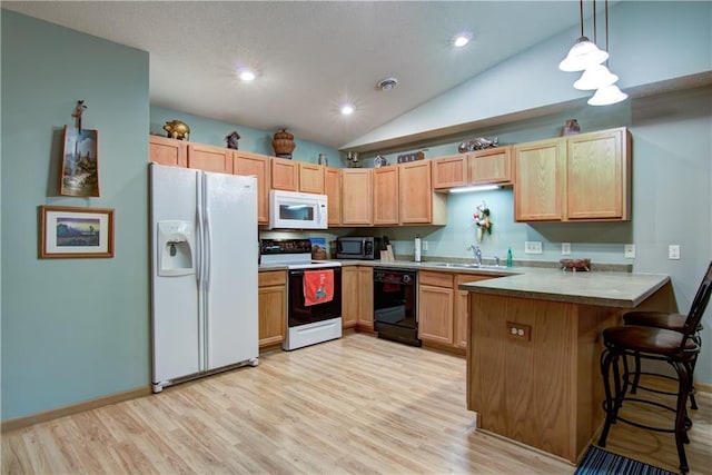 13037 40th Ave Ave, Chippewa Falls, WI 54729 - kitchen with white appliances, a peninsula, a sink, light wood finished floors, and lofted ceiling