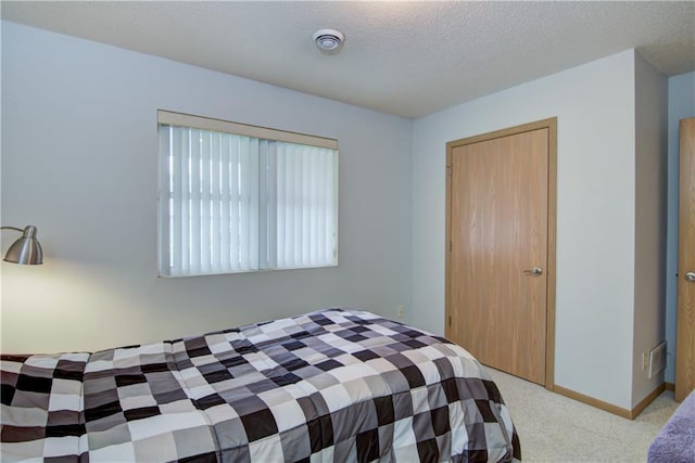 13037 40th Ave Ave, Chippewa Falls, WI 54729 - bedroom with carpet, baseboards, and a textured ceiling