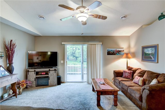 13037 40th Ave Ave, Chippewa Falls, WI 54729 - carpeted living room with a ceiling fan, a fireplace, and vaulted ceiling