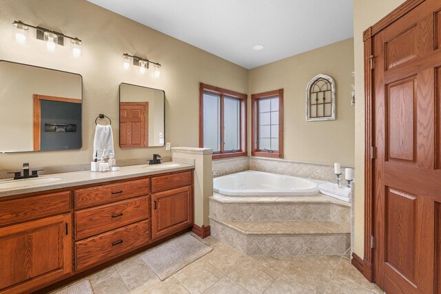 W5412 Bowe Ln, Fond Du Lac, WI 54937 - full bathroom with tile patterned flooring, a bath, and double vanity