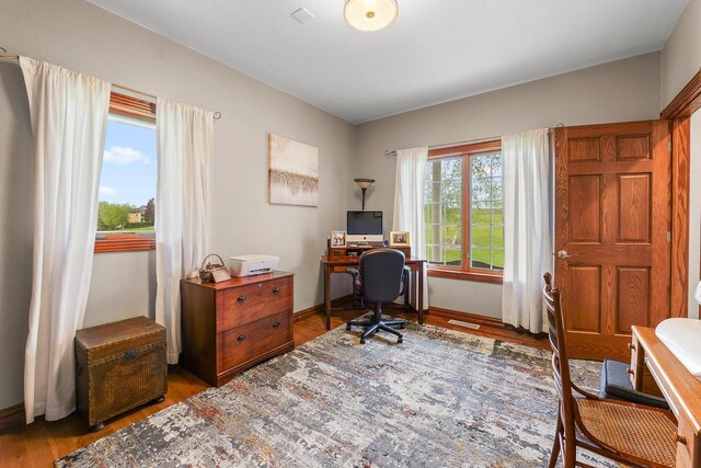 W5412 Bowe Ln, Fond Du Lac, WI 54937 - office area featuring wood finished floors and baseboards