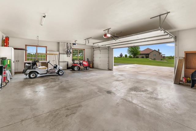 W5412 Bowe Ln, Fond Du Lac, WI 54937 - garage featuring a garage door opener