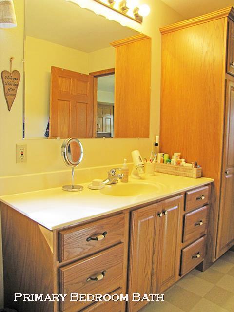 1060 Kamla Ct, Platteville, WI 53818 - bathroom featuring tile patterned floors and vanity